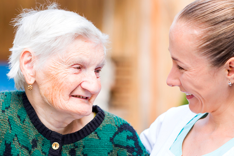 rythyms home care senior woman with young female family member rythyms home care senior woman with young female family member