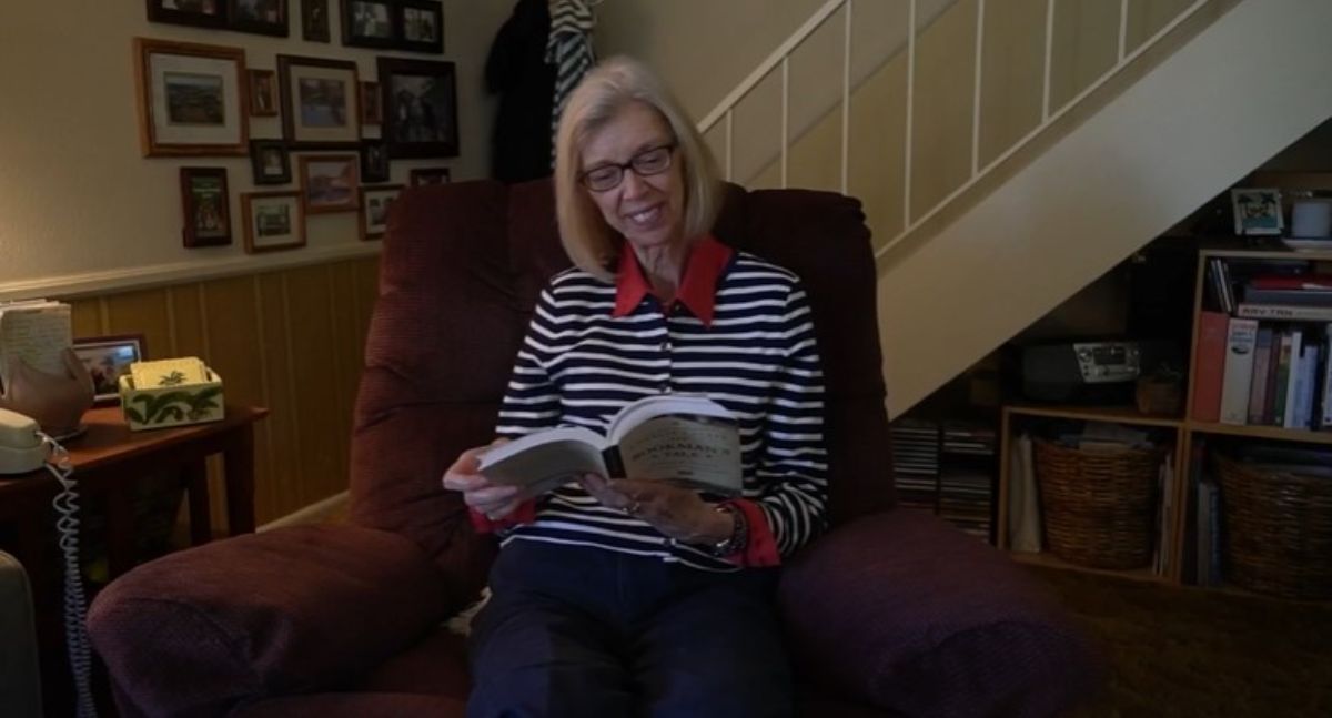 resident reading a book