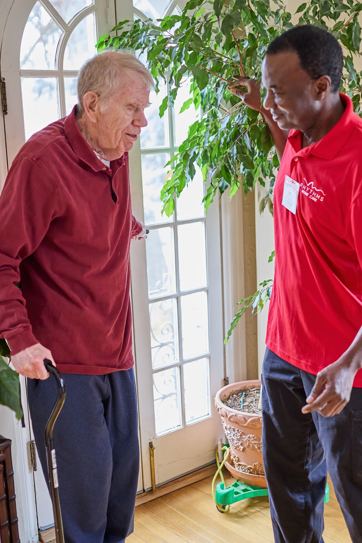 client and caregiver in living room