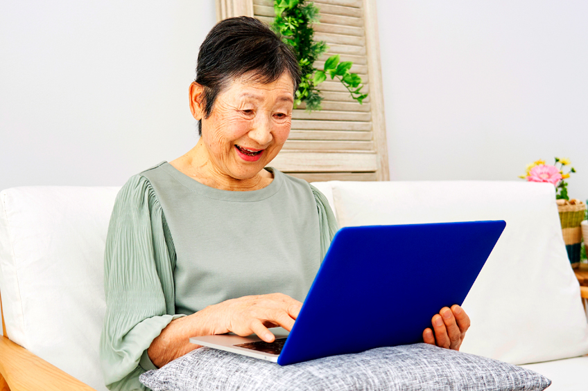 rhc senior woman on laptop smiling